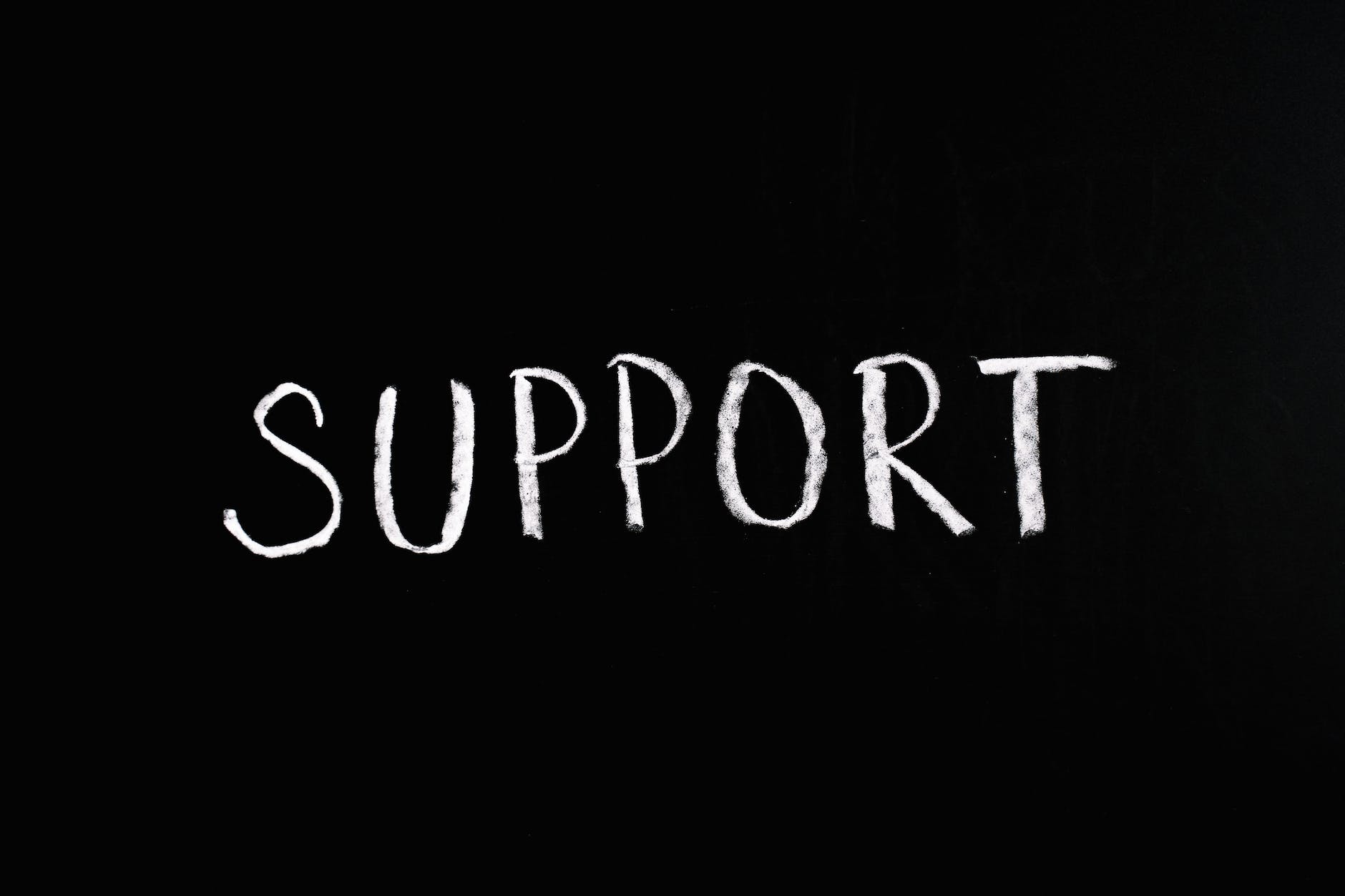 support lettering text on black background